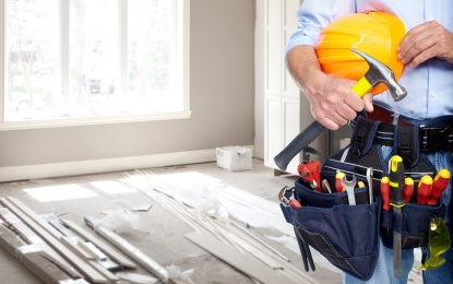 Tool belt with a hammer and hard hat in Daphne, AL